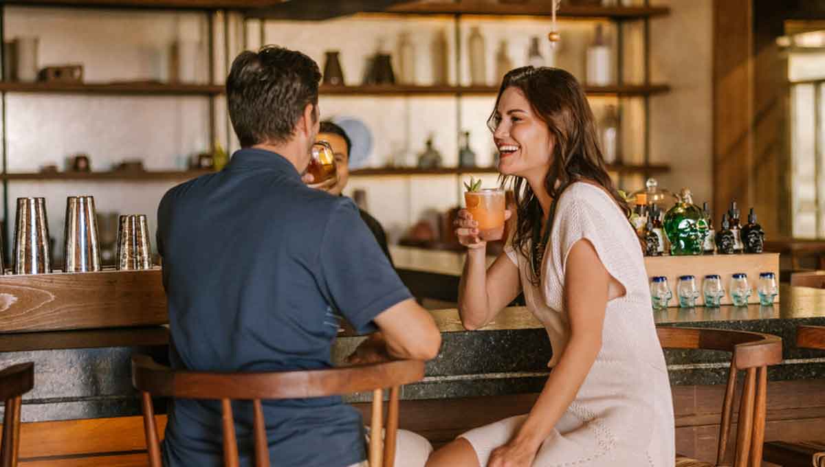 Couple take a drink at Arribo in Hard Rock Hotel Riviera Maya